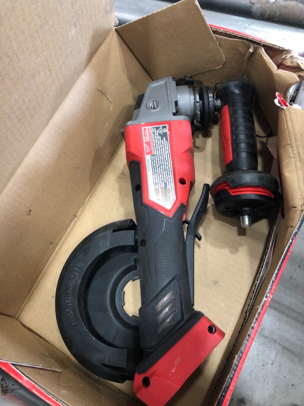 Photo 1 of Milwaukee 2880-20 M18 FUEL 4-1/2"/5" Grinder Paddle Switch, No-Lock
