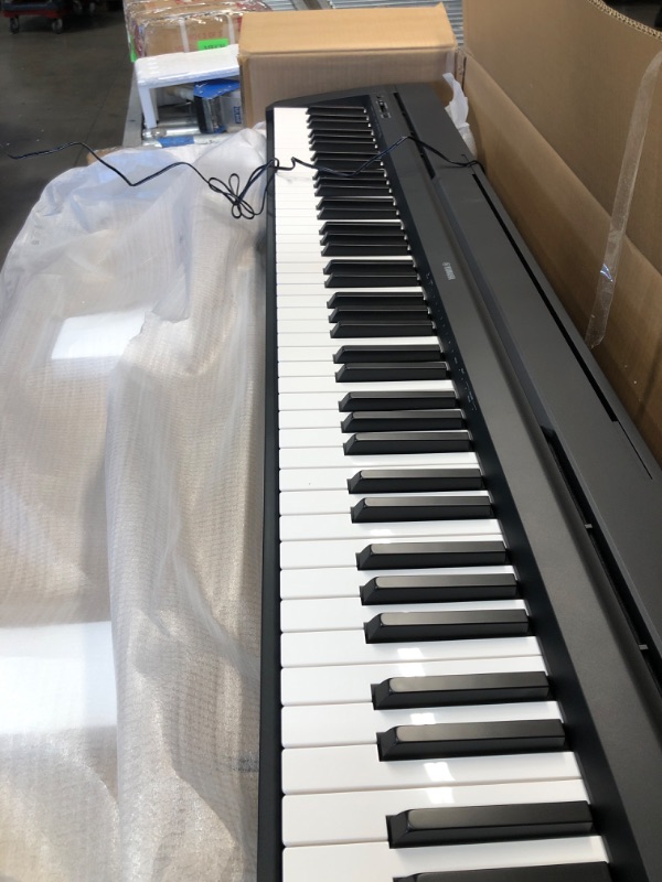 Photo 1 of YAMAHA P71 88-Key Weighted Action Digital Piano with Sustain Pedal and Power Supply 
