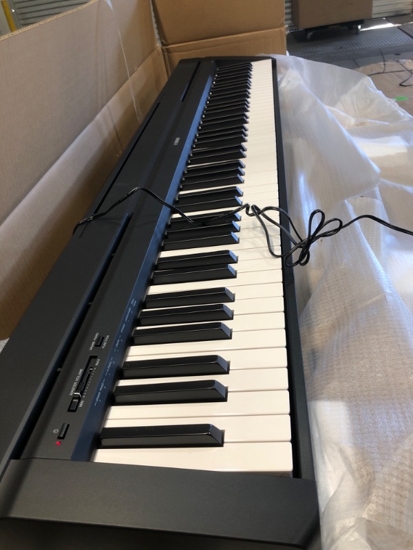 Photo 1 of YAMAHA P71 88-Key Weighted Action Digital Piano with Sustain Pedal and Power Supply 
