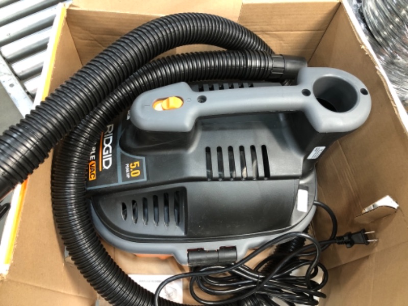 Photo 4 of ***MISSING DUST BAG, LOCKING HOSE AND CAR NOZZLE***RIDGID 4 Gal. 5.0-Peak HP Portable Wet/Dry Shop Vacuum with Filter, Dust Bag, Locking Hose and Car Nozzle, Oranges/Peaches