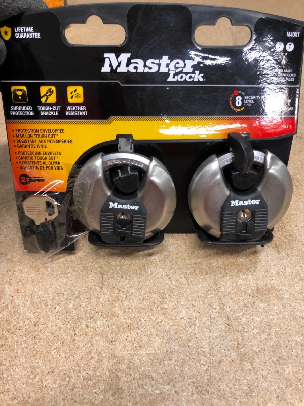 Photo 2 of *MISSING 1 key*
Master Lock Heavy Duty Outdoor Shrouded Padlock with Key, 2-3/4 in. Wide, 2 Pack