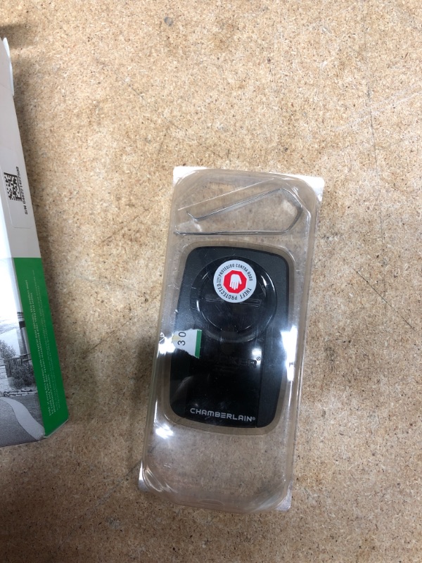 Photo 2 of *MISSING manual*
Chamberlain Universal Clicker Black Garage Door Remote Control