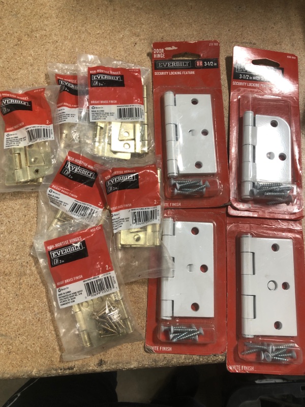 Photo 1 of **NO REFUNDS/RETURNS** - Bundle of door hinges