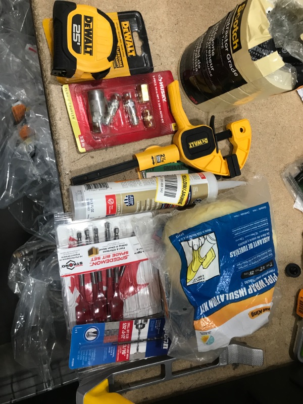 Photo 1 of **NO REFUNDS/RETURNS** - Bundle of miscellaneous home depot goods: tape, husky, dewalt, etc. 