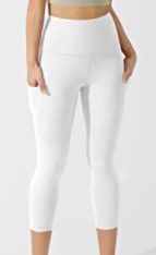 Photo 1 of ODODOS Women's High Waisted Yoga Capris with Pockets,Tummy Control Non See Through Workout Sports Running Capri Leggings, WHITE, XL
