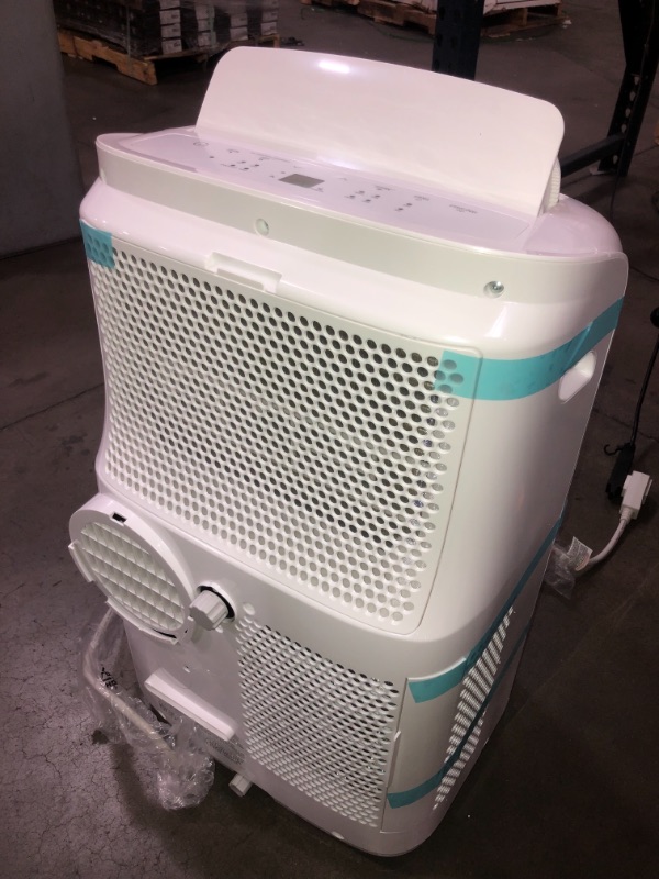 Photo 1 of Toshiba 8,000 BTU (6,000 BTU DOE) 115-Volt Portable Air Conditioner with Dehumidifier Mode and Remote for rooms up to 250 sf
