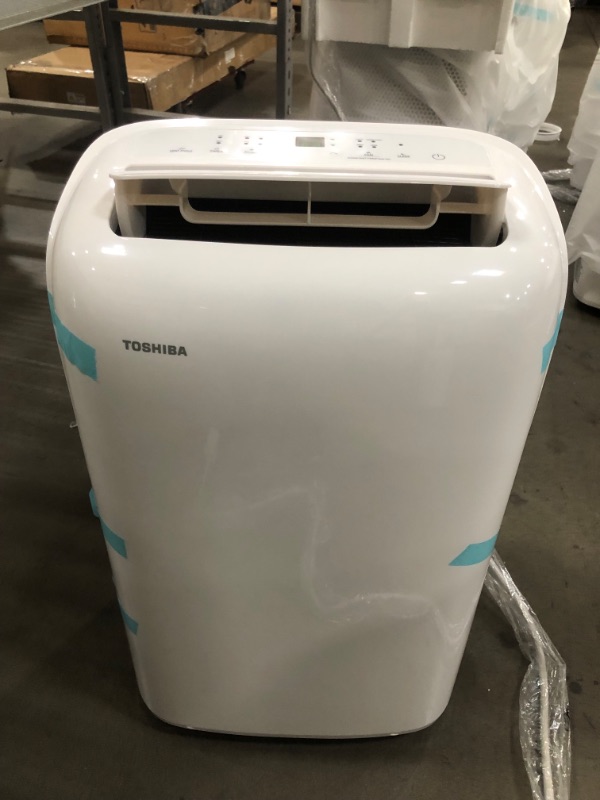 Photo 2 of Toshiba 8,000 BTU (6,000 BTU DOE) 115-Volt Portable Air Conditioner with Dehumidifier Mode and Remote for rooms up to 250 sf