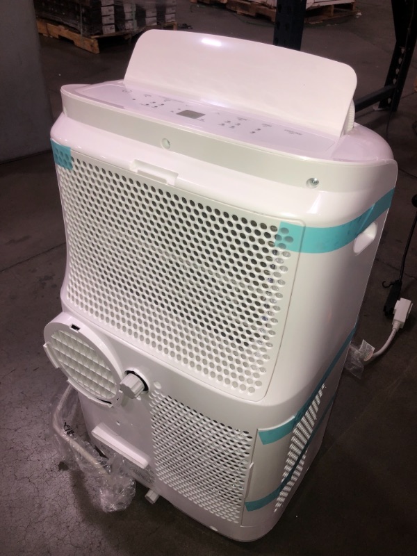 Photo 2 of Toshiba 8,000 BTU (6,000 BTU DOE) 115-Volt Portable Air Conditioner with Dehumidifier Mode and Remote for rooms up to 250 sf