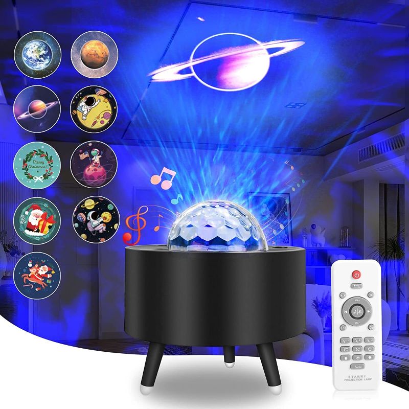 Photo 1 of Star Projector Night Light, Light up Ceiling with Ocean Wave, Bluetooth Music Speaker, Galaxy Projector LED Lamps with Christmas/Astronaut/Planet Projection, Gifts for Kids, Bedroom, Party(Black)