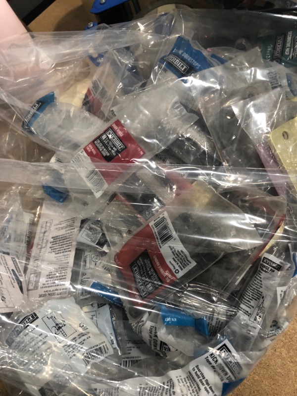 Photo 1 of ** NON REFUNDABLE ** BAG OF SORTED DOOR HINGES, DOOR STOPS, SPRING DOOR STOPS, DIFERERNT COLORS, DIFFERENT SIZES 
NON REFUNDABLE 