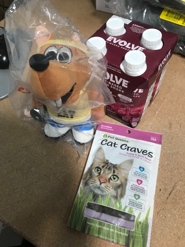 Photo 1 of *EXPIRES May and Nov 2022*
*NON REFUNDABLE*
Miscellaneous Home Bundle (Plush Toy, Plant-Based Protein Shakes 4 pk and Cat Treats)
