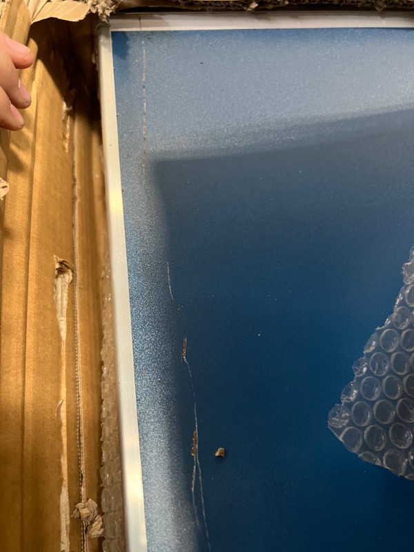 Photo 1 of INCOMPLETE INLUDES ONLY THE TABLE**GoSports 6’x3’ Mid-Size Table Tennis Game Set - Indoor/Outdoor Portable Table Tennis Game with Net, 2 Table Tennis Paddles and 4 Balls, Blue 
IT IS DAMAGEDE HAS A WHOLE ON TABLE SEE PICTURES
