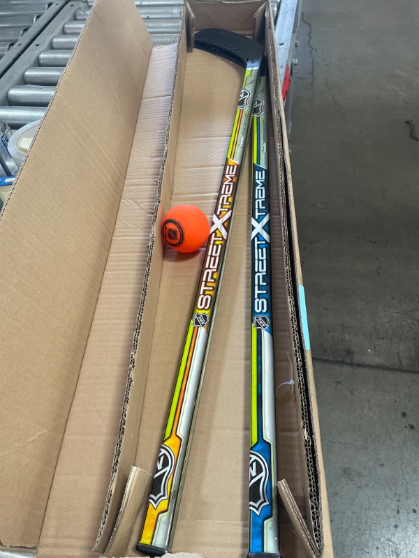 Photo 2 of Franklin Sports NHL Kids Street Hockey Stick Set - Includes (2) Youth Street Hockey Sticks + (1) Outdoor Roller Hockey Ball - Perfect Hockey Starter Set for Kids
