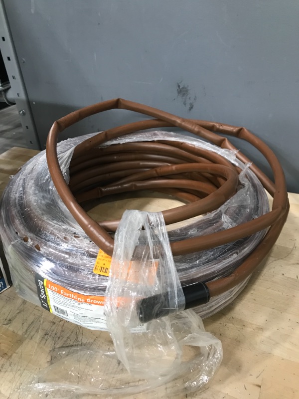 Photo 2 of *READ BELOW** DIG Earthline Brown PC 100 Ft. 1-GPH Pressure Compensating Drip Line with 12 in. Spacing (.700), Browns / Tans
