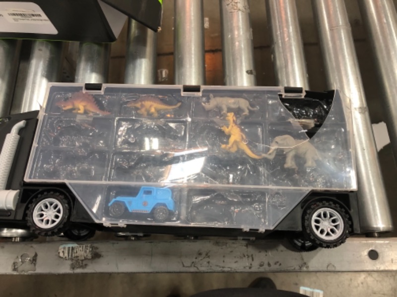 Photo 1 of Dinosaur Transport Truck, Carrier Toy Car with Dinosaurs Wild Life Car Helicopter, Portable Handle Best Dinosaur Toy for Boys Girls Age 3+(Black)
