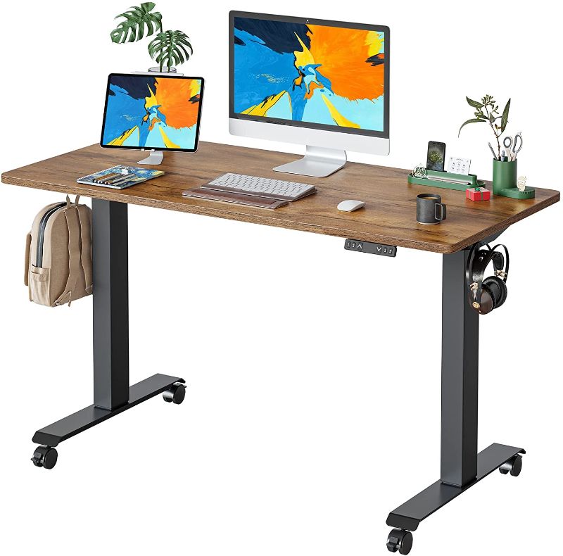 Photo 1 of FAMISKY Standing Adjustable Height Electric Stand up Desk, 48 x 24 Inches, Black Steel Frame/Rustic Brown Wood Tabletop