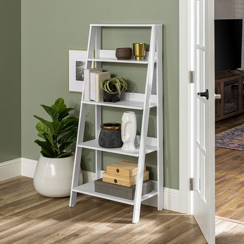 Photo 1 of *previously opened* 
*MISSING some hardware* 
*SEE last picture for damage*
Walker Edison Sophia Modern 4 Shelf Ladder Bookcase , 55 Inch, White, 55” H x 15.375” D x 24” L

