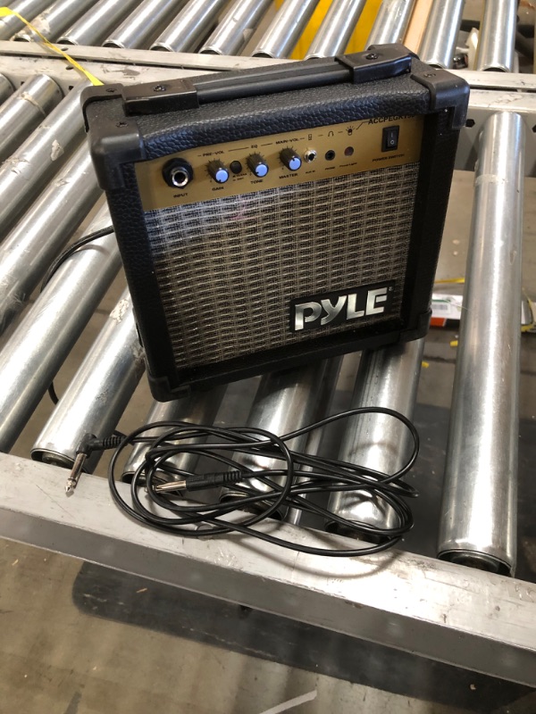 Photo 3 of *USED*
*MISSING extra string*
*SEE last picture for damage*
Pyle Electric Guitar and Amp Kit - Full Size Instrument w/Humbucker Pickups Bundle Beginner Starter Package Includes Amplifier, Case, Strap, Tuner, Pick, Strings, Cable, Tremolo - (Blue)
