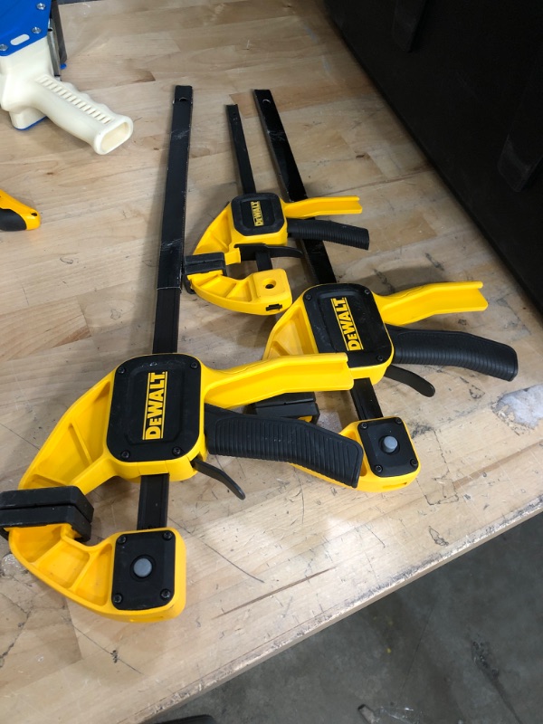 Photo 2 of **MISSING ONE** DEWALT Medium and Large Trigger Clamp (4-Pack)