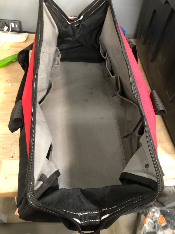 Photo 1 of **MISSING SHOULDER STRAP** Husky 24 in. 16 Pocket Zippered Tool Bag