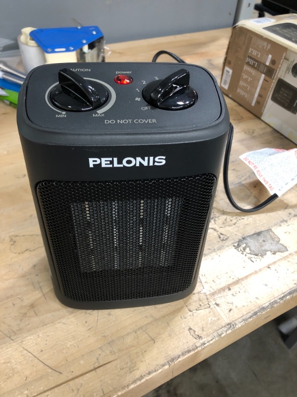 Photo 2 of **TESTED AND FUNCTIONS** Pelonis 1500-Watt 9 in. Electric Personal Ceramic Space Heater with Thermostat