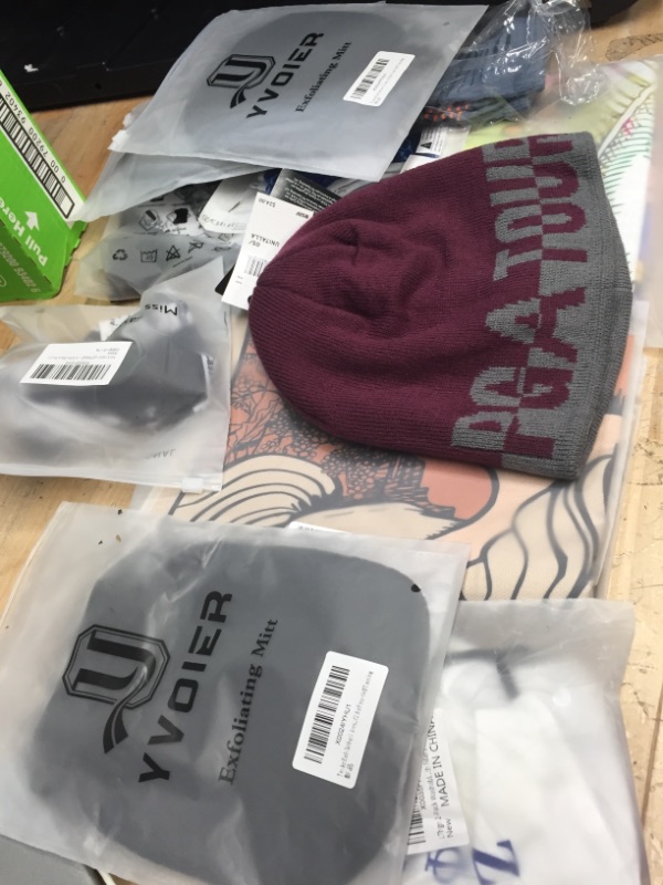 Photo 1 of **NOT REFUNDABLE** BUNDLE OF ASSORTED ITEMS (TAPESTRY,BEANIE, SOCKS, ETC...)