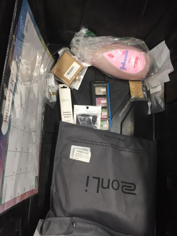Photo 1 of **NOT REFUNDABLE** BUNDLE OF ASSORTED ITEMS (CALENDAR, BABY SOAP, CLOTHING ETC...)
