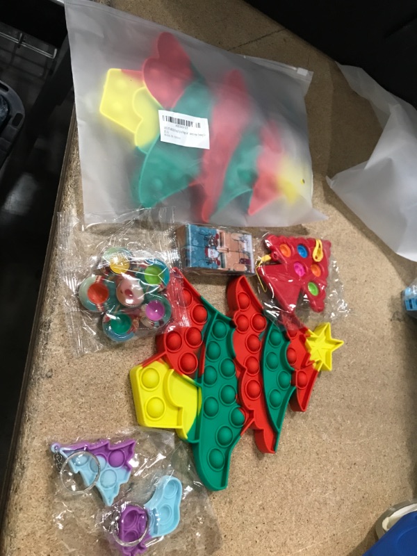 Photo 1 of **SET OF 2**
BRIGHT MOON Christmas Big Popit Fidget Toys Pack, Chirstmas Tree Fidget Packs, Popper Poppet Stress Relief Toys for Kids Christmas Set for Adults Birthday Party Favors,Classroom,Goodie Bag Fillers
