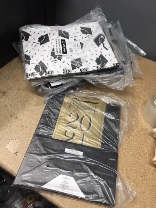 Photo 2 of **SET OF 7**SOLD AS IS, NON-REFUNDABLE
Hallmark 13" Large Graduation Gift Bags Assortment with Tissue Paper (3-Pack: Black and Gold "Class of 2021," "Congrats," Mortarboards)	13x10.4x5.7 Inch 