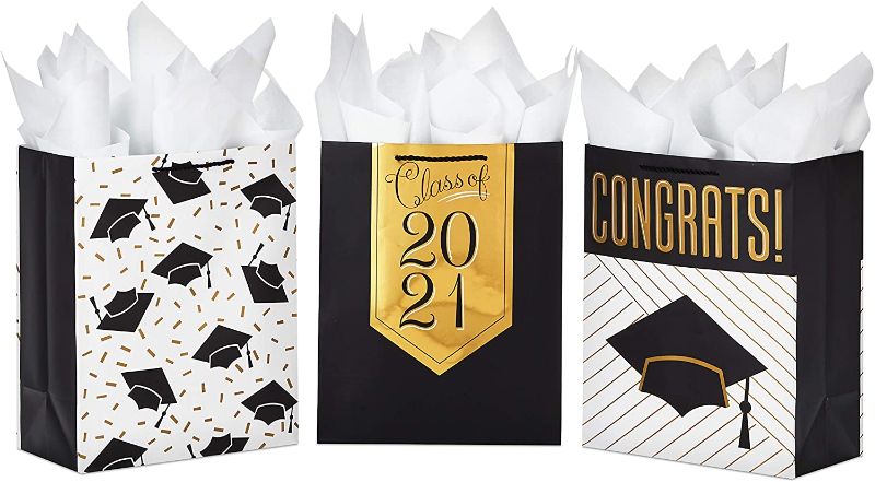 Photo 1 of **SET OF 7**SOLD AS IS, NON-REFUNDABLE
Hallmark 13" Large Graduation Gift Bags Assortment with Tissue Paper (3-Pack: Black and Gold "Class of 2021," "Congrats," Mortarboards)	13x10.4x5.7 Inch 