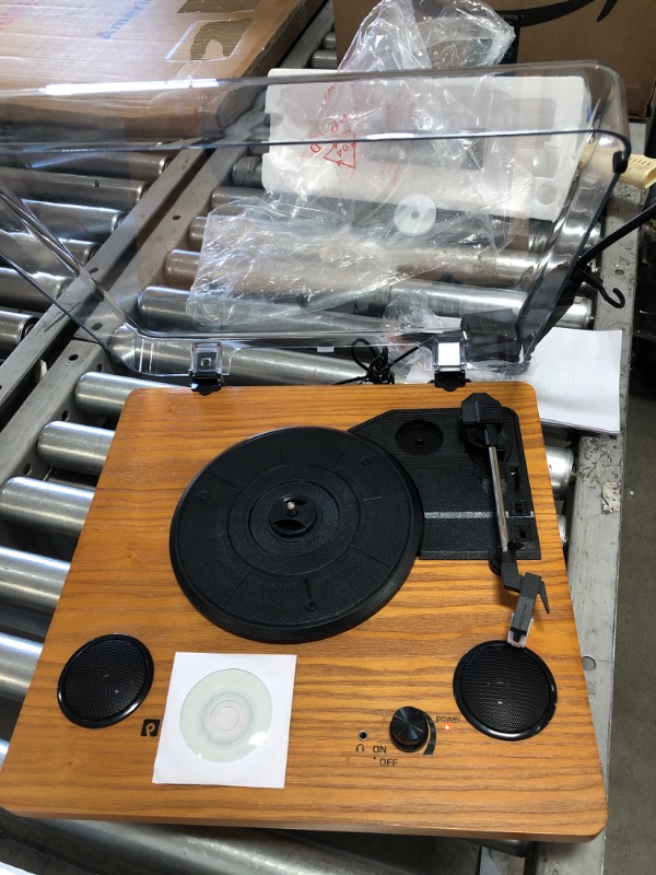 Photo 2 of ***OPEN BOX***
Record Player, Popsky 3-Speed Turntable Bluetooth Vinyl Record Player with Speaker, Portable LP Vinyl Player, Vinyl-to-MP3 Recording, 3.5mm AUX & RCA & Headphone Jack

