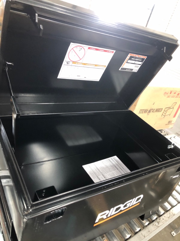 Photo 1 of ***SMALL DENT** RIDGID 32 in. W X 19 in. H X 19 in. L Portable Jobsite Storage Box, Black
