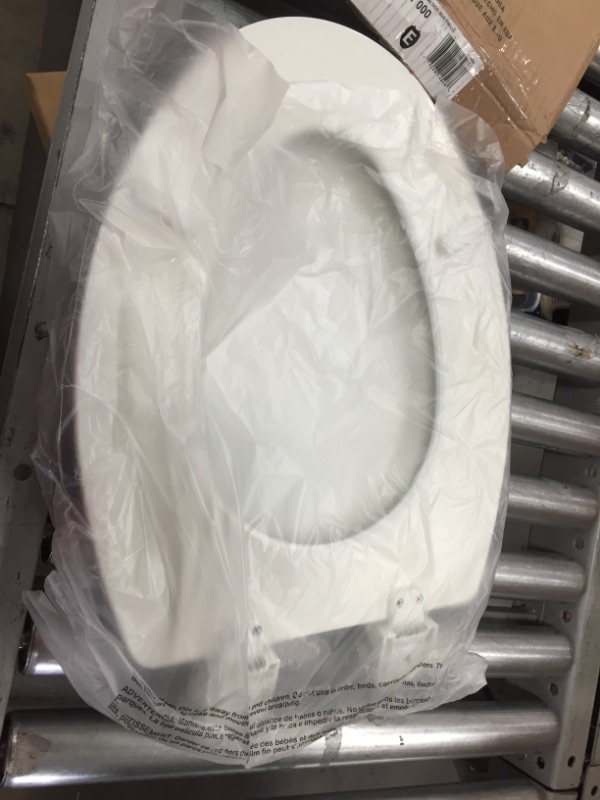 Photo 3 of BEMIS Elongated Closed Front Toilet Seat in White