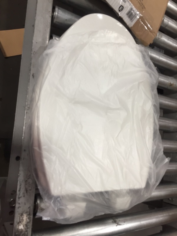 Photo 1 of BEMIS Elongated Closed Front Toilet Seat in White