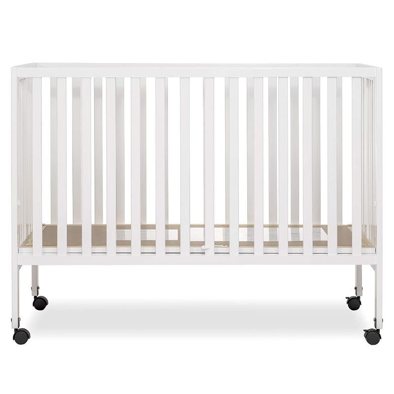 Photo 1 of Dream On Me Quinn Full-Size Folding Crib I Removeable Wheels I Modern Nursey I Adjustable Mattress Support I Patent Folding System, White , 54x31x46 Inch (Pack of 1)
