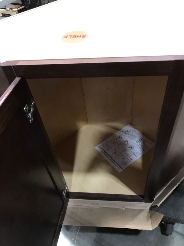 Photo 1 of **DAMAGED** Hampton Bay
Hampton Assembled 24x30x12 in. Diagonal Corner Wall Kitchen Cabinet in Cognac