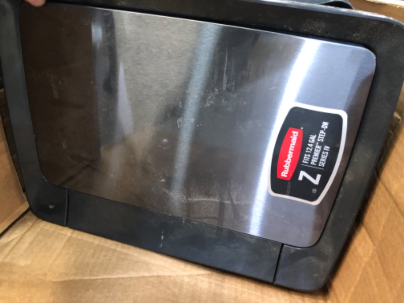 Photo 1 of **MINOR DAMAGE* Rubbermaid Premier Series III Step-On Trash Can for Home and Kitchen, with Stainless Steel Rim, 13 Gallon, Charcoal

