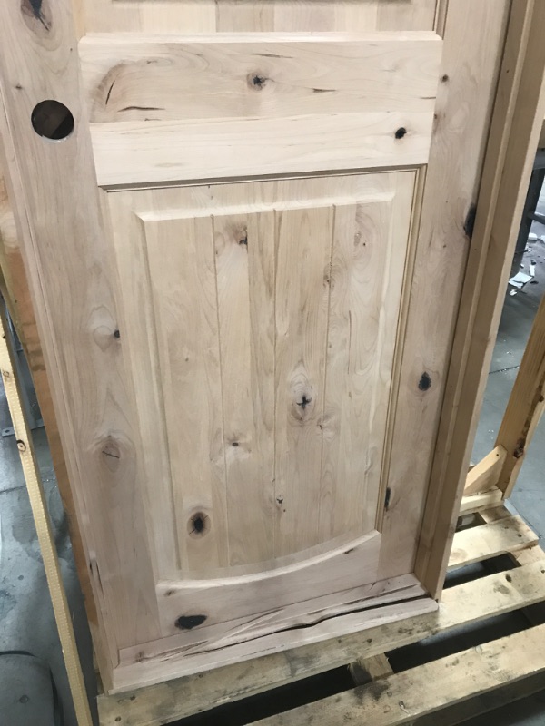 Photo 2 of **MINOR WARE FROM SHIPPING** Krosswood Doors
30 in. x 80 in. Knotty Alder 2 Panel Top Rail Arch V-Groove Solid Wood Right-Hand Single Prehung Interior Door