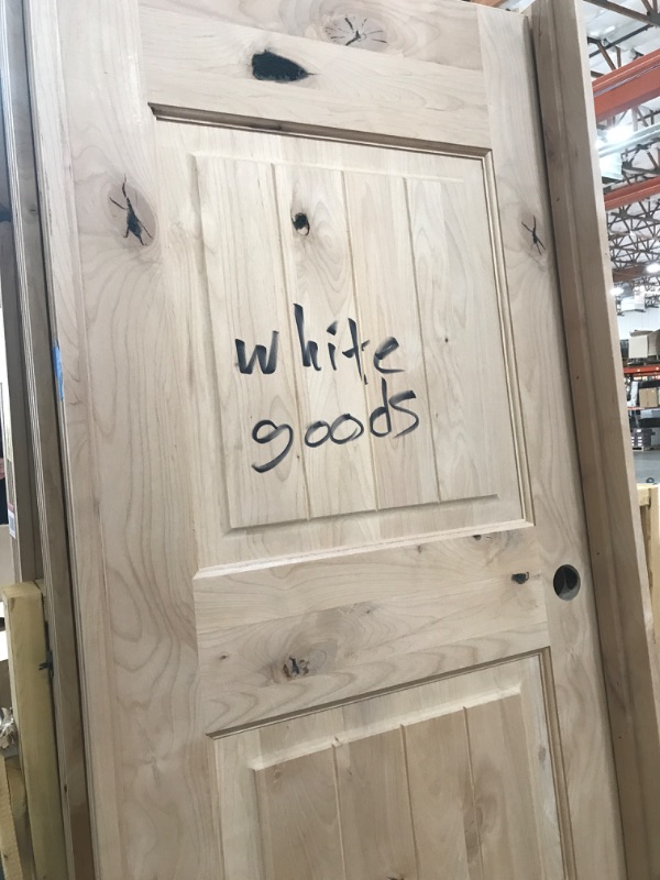 Photo 3 of **MINOR WARE FROM SHIPPING* Krosswood Doors
30 in. x 80 in. Knotty Alder 2 Panel Top Rail Arch V-Groove Solid Wood Right-Hand Single Prehung Interior Door