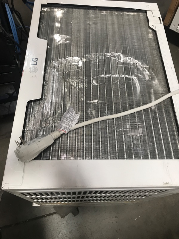 Photo 1 of **DAMAGED MISSING PARTS** LG Electronics
22,000 BTU 230/208-Volt Dual Inverter Window Air Conditioner LW2217IVSM Cools 1,300 Sq Ft, Wi-Fi Enabled with Remote