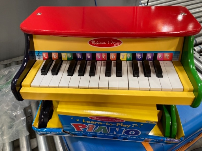 Photo 2 of Melissa & Doug Learn-To-Play Piano With 25 Keys and Color-Coded Songbook
