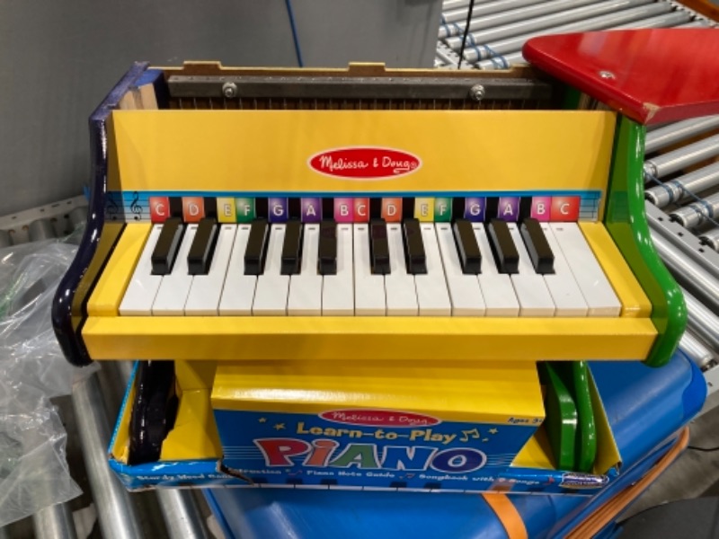 Photo 1 of Melissa & Doug Learn-To-Play Piano With 25 Keys and Color-Coded Songbook
