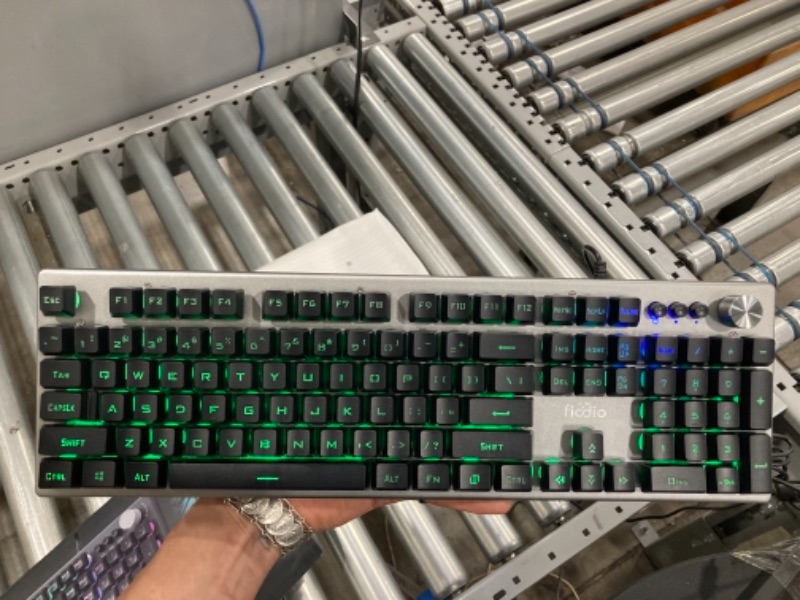 Photo 2 of FIODIO Membrane Gaming Keyboard, Wired RGB Rainbow Backlit Keyboard, Ergonomic Standard Keyboard for Desktop, Computer and PC, Silver-Black (FK-2028-US)
