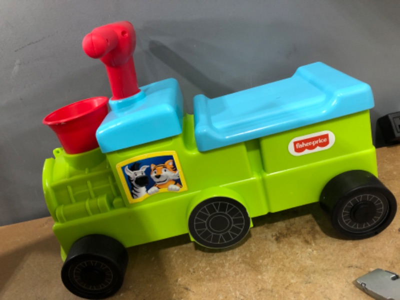 Photo 2 of Fisher-Price Ride On for Kids and Baby Tootin’ Train Ride-On