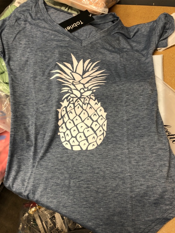 Photo 1 of TOBRIEF PINEAPPLE V NECK SIZE SMALL.