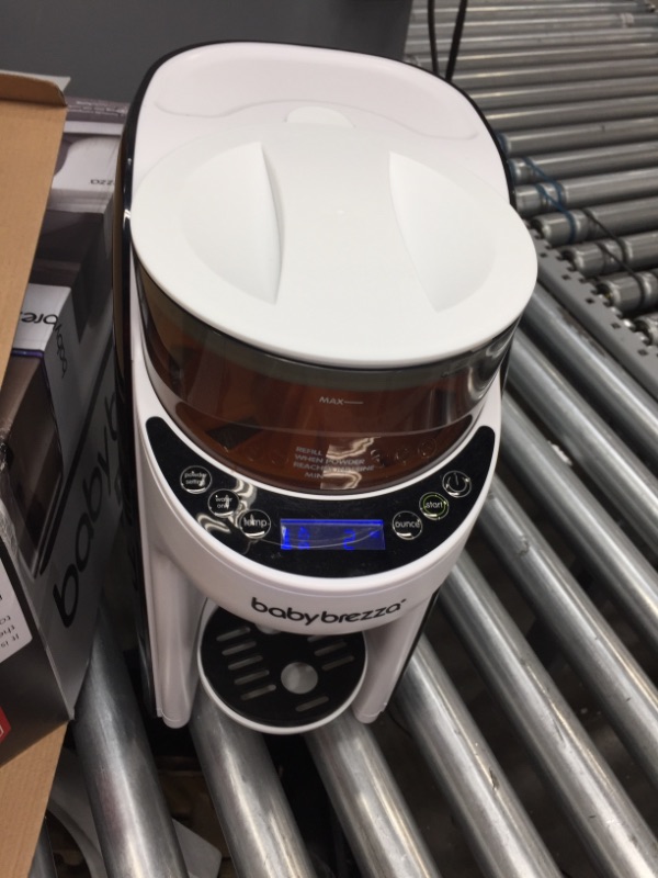 Photo 2 of New and Improved Baby Brezza Formula Pro Advanced Formula Dispenser Machine - Automatically Mix a Warm Formula Bottle Instantly - Easily Make Bottle with Automatic Powder Blending
