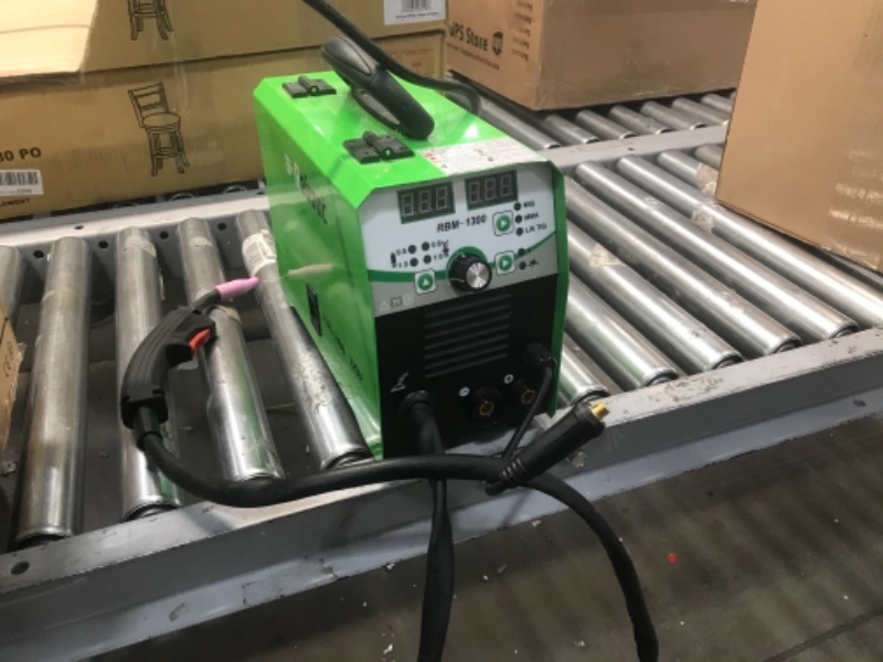 Photo 3 of Reboot Mig Welder 4 in 1 Gas/Gasless IGBT Inverter Flux Core RBM-1300 Lift Tig MMA Mig Welding Machine AC 220V Multiprocess Welder Solid Wire MIG Welding Machine Newbie
