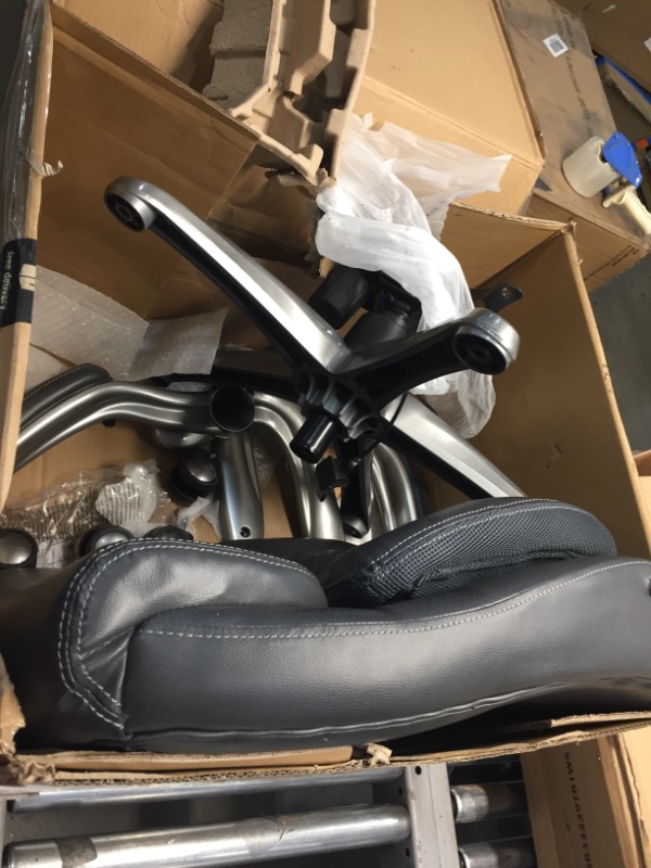 Photo 1 of **INCOMPLETE**AmazonCommercial Ergonomic Executive Office Desk Chair with Flip-up Armrests - Adjustable Height, Tilt and Lumbar Support - Black Bonded Leather**PARTS  ONLY**
