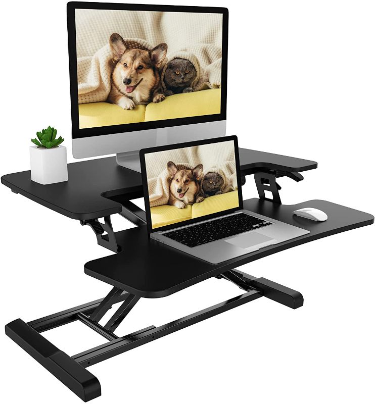 Photo 1 of FLEXISPOT Standing Desk Converter 28 Inches Stand up Desk Riser, Height Adjustable Home Office Desk with Deep Keyboard Tray for Laptop (M7B)
