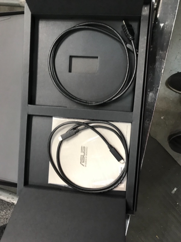Photo 1 of missing charging cable 
ASUS ROG Strix 17.3" 1080P Portable Gaming Monitor (XG17AHPE) - Full HD, IPS, 240Hz, 3ms, Adaptive-Sync, Smart Case, Ultra-slim, USB-C Power Delivery, Micro HDMI, For Laptop, PC, Phone, Console